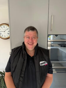 A picture of SImon Holmes in the Oven Rescue uniform