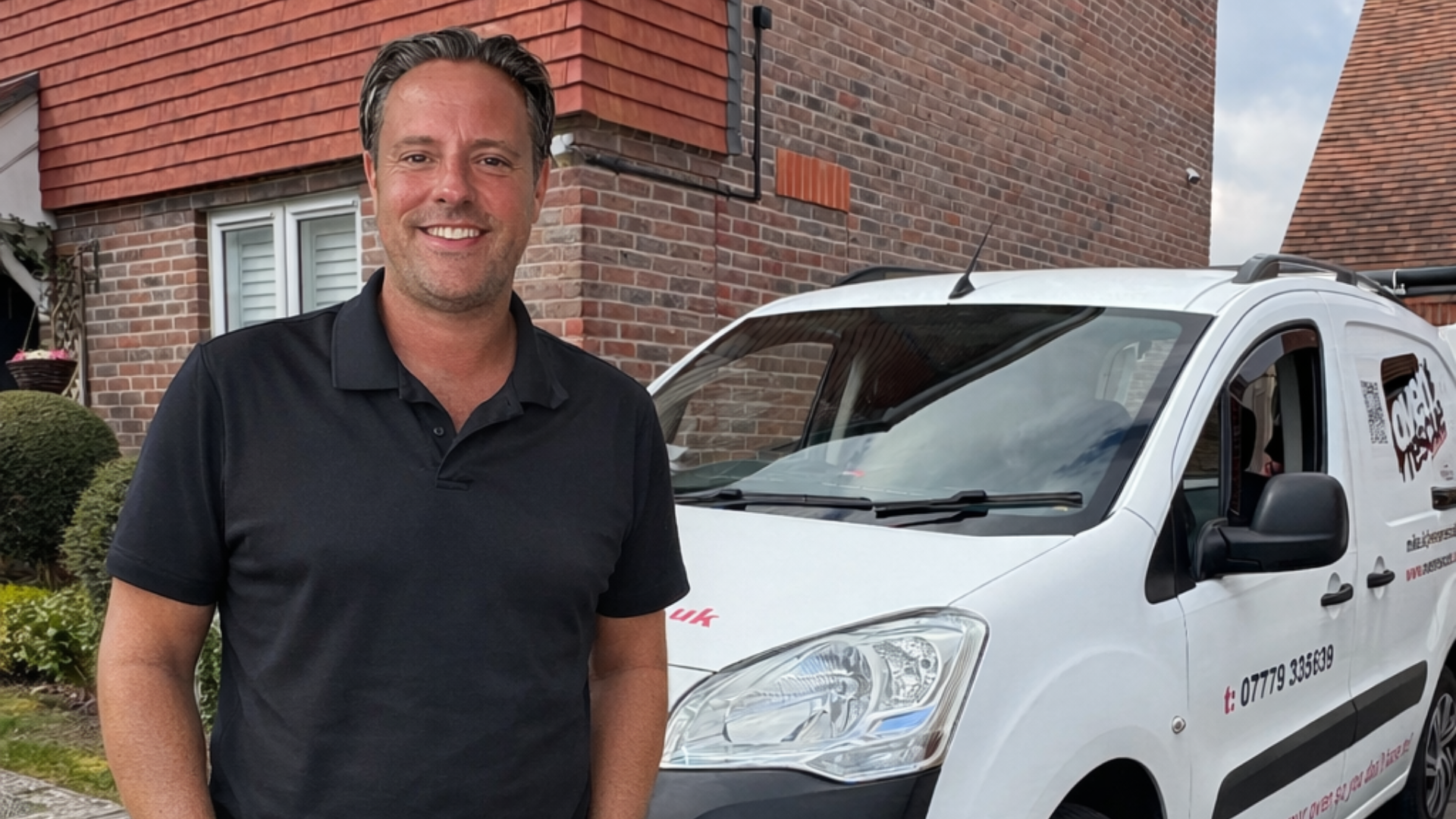 Brett Kempe, owner of Oven Rescue Croydon smiling in front of van
