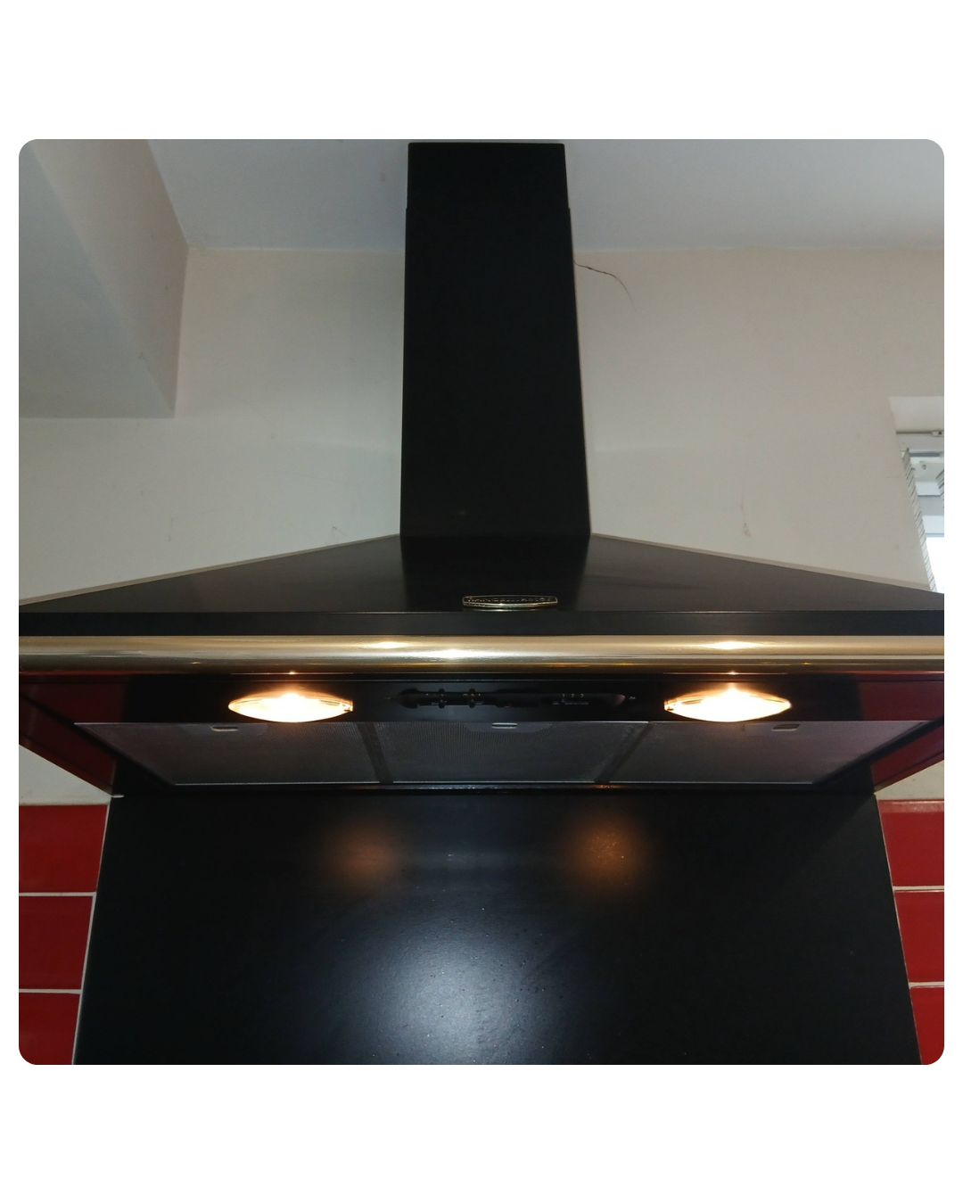 Deep cleaned extractor fan above cooker hob