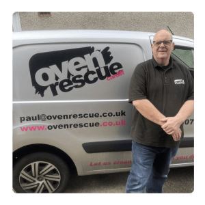 man smiling in front of oven rescue cardiff van